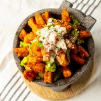 Guacamole Carnadas  · Fresh home made guacamole made to order mild or spicy,fried plantain and fried cheese