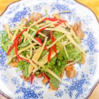 Calamari Salad · Mixed green fried calamari, mango, pomegranate, cashews, sweet pepper and creamy balsamic vi...