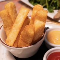 Fried Yucca · Served with Malagueta spicy mayo and ketchup
