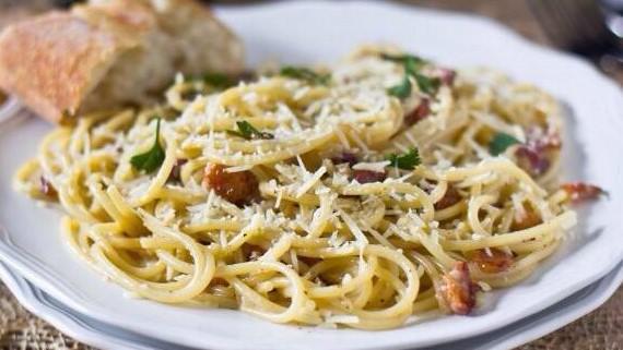 Carbonara (Spaghetti) · Bacon, heavy cream, green peas, Parmesan cheese.