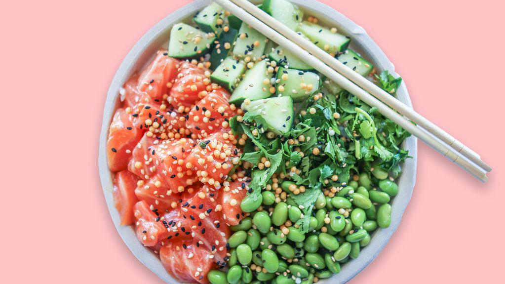 The Classic Poke Bowl · Sushi Grade Salmon, cilantro, edamame, cucumbers, sesame seeds, rice puffs, topped with ponzu sauce