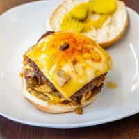 Volcano Burger · Double cheeseburger with jalapeños, mushrooms, American cheese, Swiss cheese, and spicy mayo...