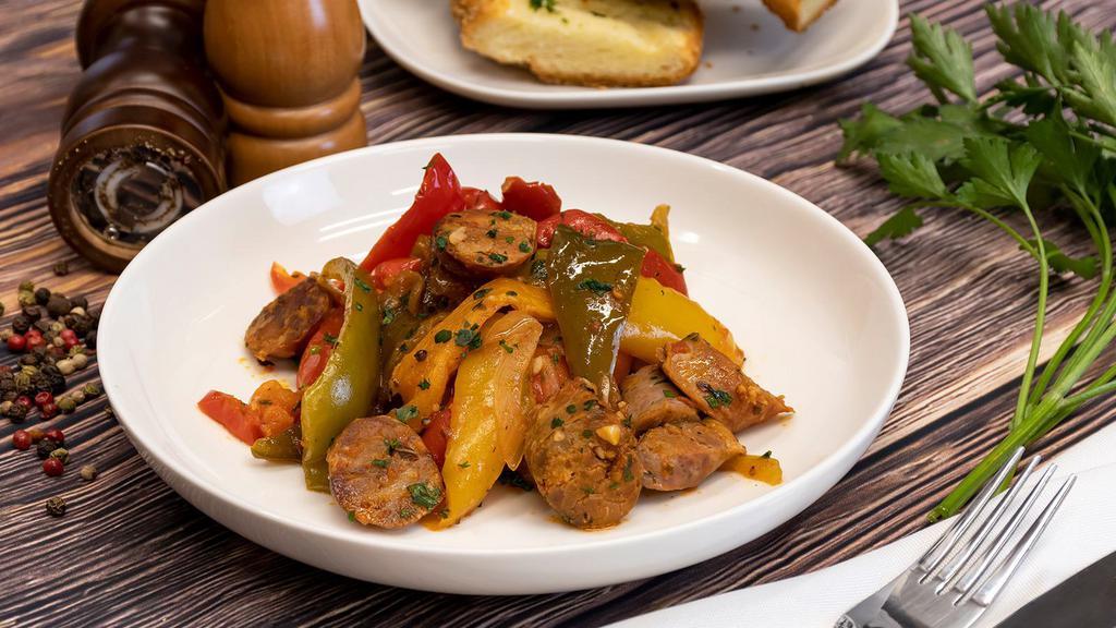 Sausage & Pepper Dinner · Homemade sausage slowly cooked with peppers, onions, and garlic. This meal is served cold ready to heat up in your oven or microwave.