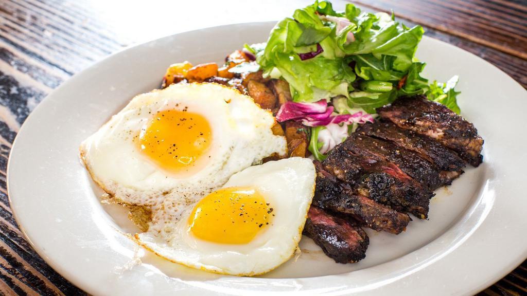 Steak & Eggs · Thin-sliced skirt steak, two eggs any style, and herb-roasted potatoes.