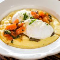 Eggs & Polenta · Poached eggs, tomatoes, and mushrooms over creamy parmesan polenta.