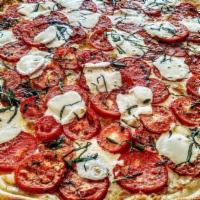 The Caprese Pie · mozzarella, roasted plum tomatos,sicilian oregano, olive oil