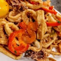 Calamari Scarpariello · in a white wine sauce with sweet and hot vinager peppers