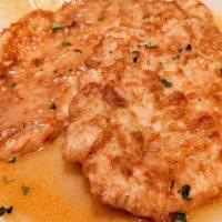 Chicken Francese · sauted chicken breast in a lemon butter , white wine sauce