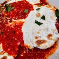 Veal Parmesan · veal tenderlion cutlets topped with fresh mozzarella