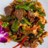 Spicy Triple Charm · Spicy. Dry sautéed chicken, beef in spicy black pepper sauce, shrimp, and selected vegetable...