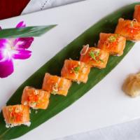 Salmon Deluxe Roll · Spicy salmon inside, salmon on top with salmon roll and scallion.