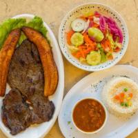 Desayuno Con Carne Asada / Breakfast With Carne Asada · Arroz con frijoles, arepa con queso. Elección de bistec asado o salchicha colombiana. / Mixe...