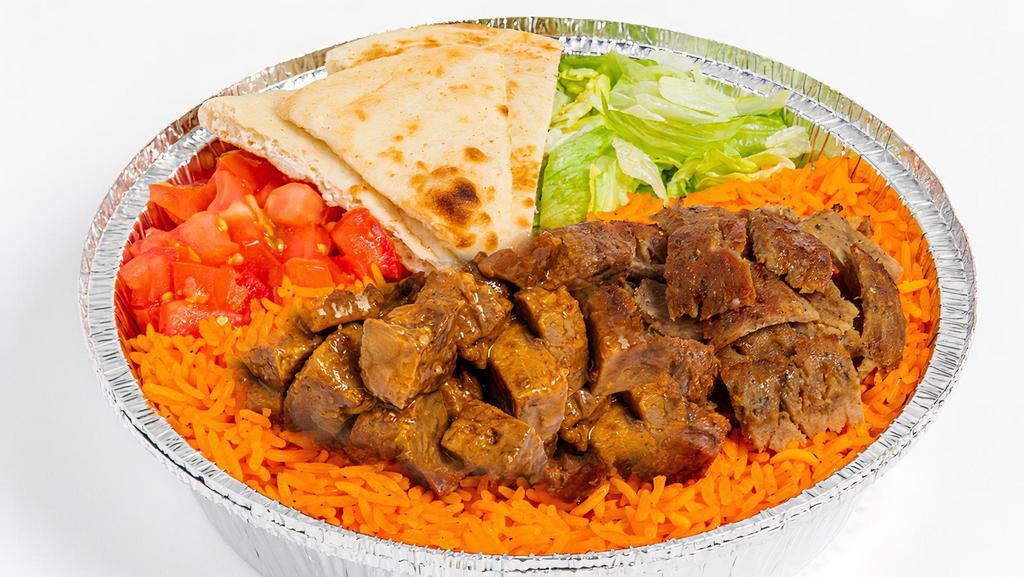 Savory Herb Beef & Gyro Platter · Tender, seared sirloin marinated in a Savory spice blend with savory beef gyro atop a bed of basmati rice and served with lettuce, tomato, and pita