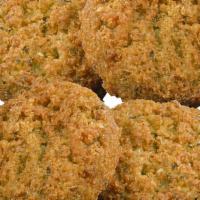 Falafel (4) · 4 pieces of the deep-fried ball made from ground chickpeas and a blend of herbs and spices. ...
