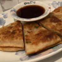 Scallion Pancake · Savory folded flatbread.