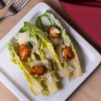 Caesar Salad · Crispy romaine, pancetta anchovy dressing, house made garlic croutons, shaved paramesan cheese