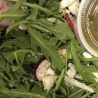 Arugula Salad · Baby arugula, fennel, radish tossed with extra virgin olive oil & fresh lemon juice topped w...