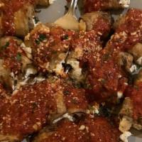 Eggplant Rollatine · Eggplant stuffed with mozzarella, ricotta, and parmesean cheese topped with marinara and moz...