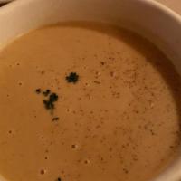 Shrimp Bisque · Velvety smooth shrimp bisque made with sherry wine, a touch of cream, and chunks of shrimp