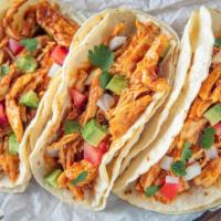 Bbq Chicken Tacos · Tasty tacos with BBQ Chicken, fresh pico de gallo, roasted corn, black beans, cheddar and Mo...