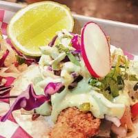 Ensenada Panko Crusted Cod Fish · Panko encrusted Cod fish with red and green cabbage topped jalapeño mayo. Served in flour to...
