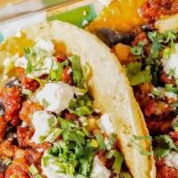 Toluca Chorizo · Mexican chorizo stew with potatoes, black beans, queso fresco. and cilantro. Made with Glute...