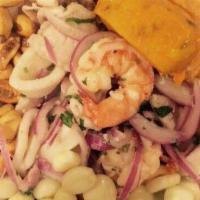 Ceviche De Camarones · Shrimps marinated in lime juice and hot pepper.