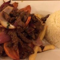Lomo Saltado · Sautéed steak with tomato, red onions and served with rice and French fries.