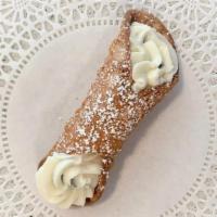 Classic Cannoli · Cannoli cream (made with ricotta cheese and chocolate chips) in a classic cannoli shell