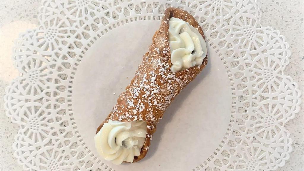 Classic Cannoli · Cannoli cream (made with ricotta cheese and chocolate chips) in a classic cannoli shell