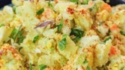 Potato Salad (Ensalada De Papa) · Potato salad with carrots peppers and onions.