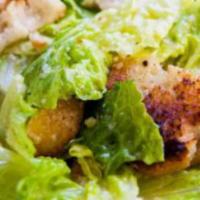 Caesar Salad · Mixed green salad drizzled with creamy caesar dressing.