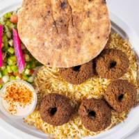 Classic Falafel Platter · Our Freshly made Falafel. Served on a bed of Egyptian rice and mum salad.