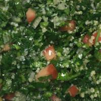 Tabbouleh · Bulgur Wheat, Parsley, Mint, Garlic, Onion, Tomatoes & Peppers.