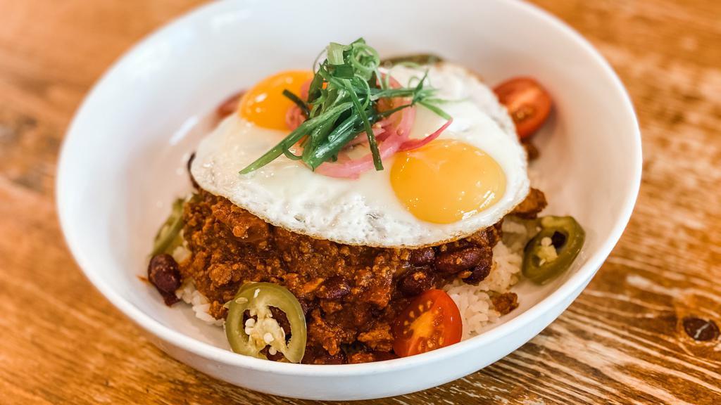 Scratch Chili Moco · blend of ground beef and pork with andouille sausage, bell peppers, onions, celery served over garlic rice with 2 sunny side eggs