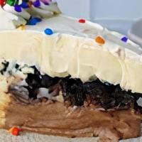 Sheet Ice Cream Celebration Cake · Layers of freshly made premium vanilla and chocolate ice cream, separated by a layer of our ...