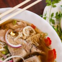 Large Beef Combination Noodle Soup · Large bowl of fresh rice noodle with beef broth and combination of sliced raw beef, brisket,...