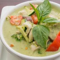 Green Curry · Spicy homemade Thai green curry with coconut milk, basil, and seasonal mixed vegetable.