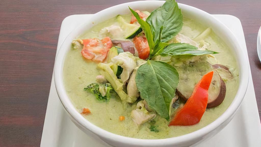 Green Curry · Spicy homemade Thai green curry with coconut milk, basil, and seasonal mixed vegetable.