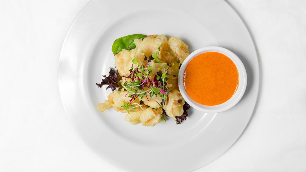 Rock Shrimp Tempura · With sweet and spicy sauce. Spicy.