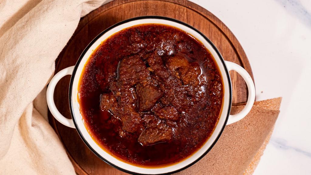 Siga Wot · Tender beef stew slow cooked for hours in a caramelized onions and berbere sauce. Traditionally served with injera, this dish can also be enjoyed with yellow basmati rice.