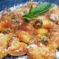 Gnocchi · Vegetarian. 
Comes with tomato sauce, basil, and Parmesan cheese.