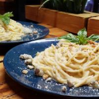 Spaghetti 4 Formaggi · 4 cheese. Gorgonzola, Parmesan, goat cheese, fontina cheese, and heavy cream.