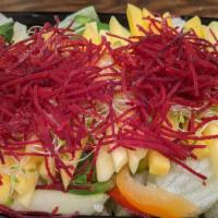 Mango Salad · Shredded mango, mixed greens, asparagus, peppers, alfalfa sprouts and beets with miso sauce.