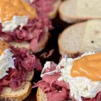 Reuben · HOT PASTRAMI & SWISS ON RYE TOAST WITH COLE SLAW & RUSSIAN DRESSING