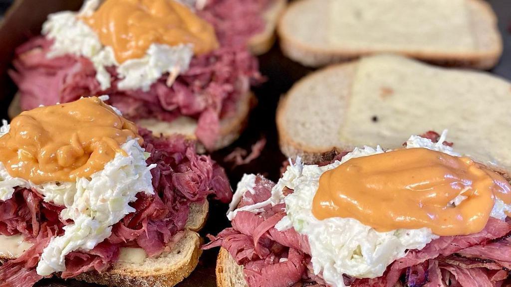 Reuben · HOT PASTRAMI & SWISS ON RYE TOAST WITH COLE SLAW & RUSSIAN DRESSING