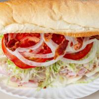13) Club Sub · HAM, TURKEY, PROVOLONE & BACON WITH CHOICE OF TOPPINGS