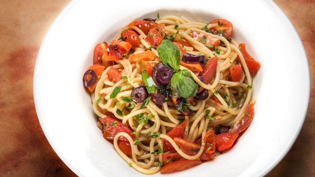 Spaghetti Primavera · Cherry tomatoes, black olives, roasted peppers, capers with garlic, and olive oil.