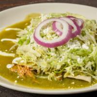 Enchiladas Suizas · Three soft corn tortillas rolled with choice of stuffing in creamy chile poblano sauce toppe...