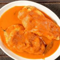Chiles Rellenos · Roasted poblano peppers stuffed with queso Blanco in a mild tomato sauce.